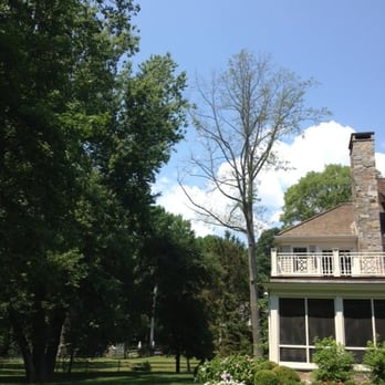 Celtic Tree & Landscape - a view of a house from the lawn - Tree Services Near Me