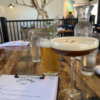 Lillian's - Fresh flowers on the table and a jackalope mural - Breakfast & Brunch Near Me - Charleston, South Carolina Lillian's - Fresh flowers on the table and a jackalope mural - Breakfast & Brunch Near Me - Charleston, South Carolina