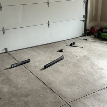 Ascension Garage Door Services - old springs and parts just on the floor - Garage Door Services Near Me Ascension Garage Door Services - old springs and parts just on the floor - Garage Door Services Near Me