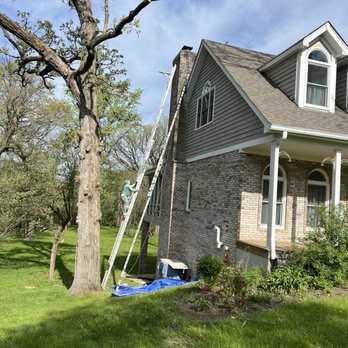 Kerry Tuckpointing - What a ladder! Clearly not afraid of heights. - Roofing Near Me - Evergreen Park, Illinois