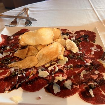 Eddie Merlot's - Carpaccio with handmade chips - Steakhouses Near Me - Ashburn, Virginia