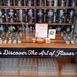 Locals Kitchen + Market - A sampling station of different kinds of oil and vinegar