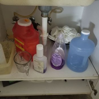 Aesthetics Northwest Institute - Under the sink in the facial room, and the bowl of used sponges in the back because they like to reuse sponges - Day Spas Near Me - Bellevue, Washington