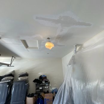 Drywall Perfection - a room with a ceiling fan in it - General Contractors Near Me - Surprise, Arizona