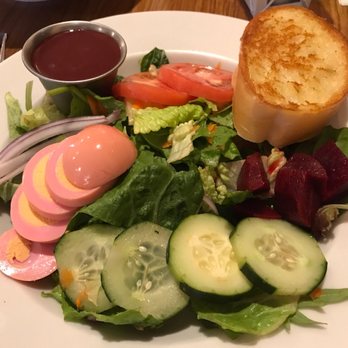 The Babcock House - Babcock House Salad with pickled egg, pickled beets, greens, tomatoes and cakes with blackberry vinegarette dressing - Bed & Breakfast Near Me - Appomattox, Virginia