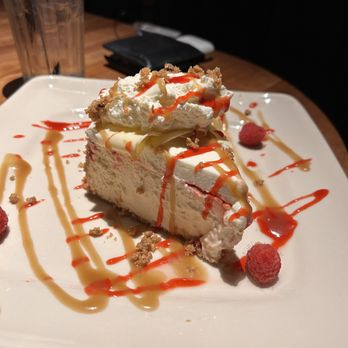The White Chocolate Grill - White Chocolate Raspberry Cheesecake - American Near Me - Phoenix, Arizona The White Chocolate Grill - White Chocolate Raspberry Cheesecake - American Near Me - Phoenix, Arizona