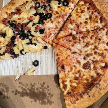 Pizza Hut - a pizza in a box with a slice missing - Pizza Near Me - San Antonio, Texas