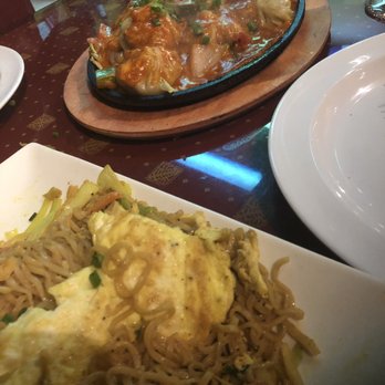 Everest Nepali Kitchen - Momo-zza and street noodles with egg - Indian Near Me - Cary, North Carolina Everest Nepali Kitchen - Momo-zza and street noodles with egg - Indian Near Me - Cary, North Carolina