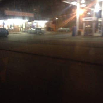 Dongar Food Mart - a car parked in front of the store - Convenience Stores Near Me - Louisville, Kentucky