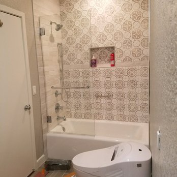 Serpas Building and Remodeling - a bathroom with a toilet and bathtub - Kitchen & Bath Near Me - Glendora, California