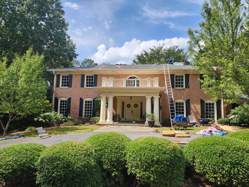 Slide of The Roofing Specialists