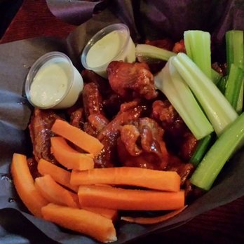 Wheat Sheaf Tavern - Medium/BBQ - 25 wings in the picture as my friends and I shared a grand slam (50 wings). Tasted more medium than bbq, still good - Pubs Near Me - Toronto, Ontario Wheat Sheaf Tavern - Medium/BBQ - 25 wings in the picture as my friends and I shared a grand slam (50 wings). Tasted more medium than bbq, still good - Pubs Near Me - Toronto, Ontario