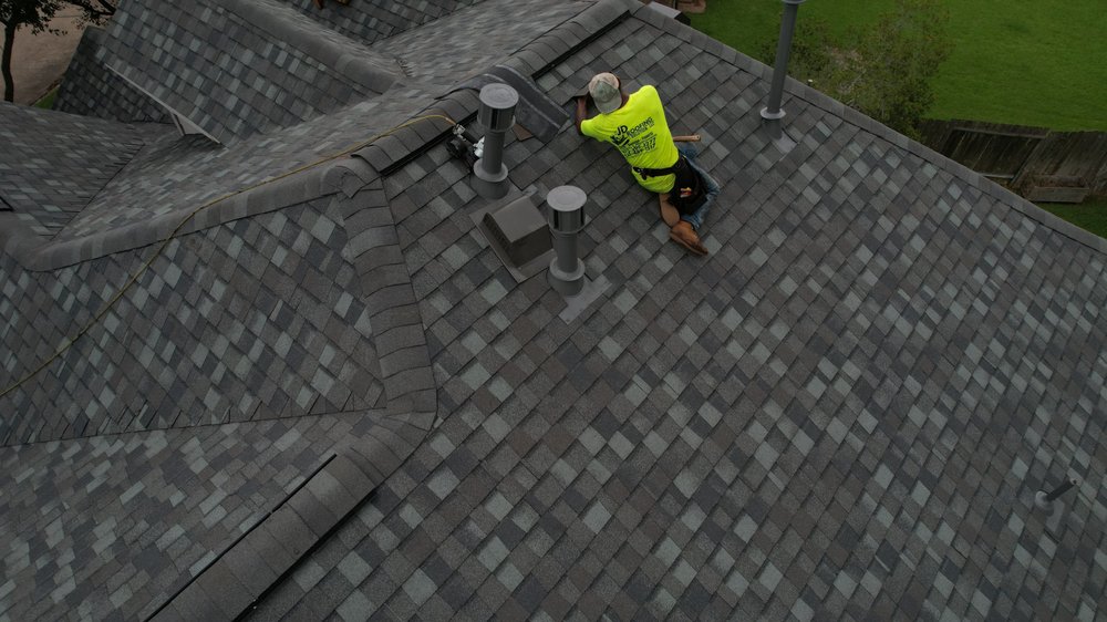 Slide of JD Roofing Solutions