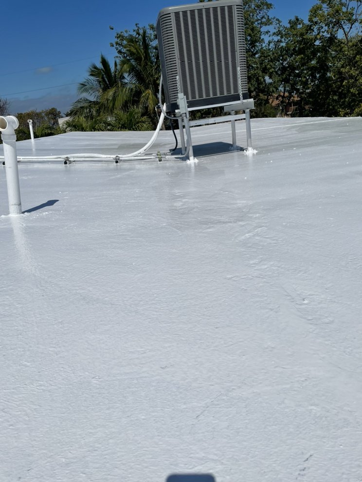 Slide of Andy The Roofer & Co