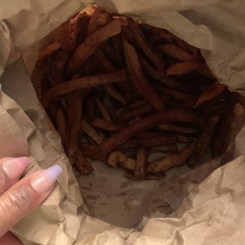 Pizza Heaven - a person holding a bag of french fries - Pizza Near Me - East Greenwich, Rhode Island Pizza Heaven - a person holding a bag of french fries - Pizza Near Me - East Greenwich, Rhode Island