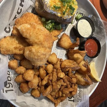 Red Lobster - Admiral's Feast with clams scallops flounder and loaded baked potato - Seafood Near Me - Riverside, California Red Lobster - Admiral's Feast with clams scallops flounder and loaded baked potato - Seafood Near Me - Riverside, California