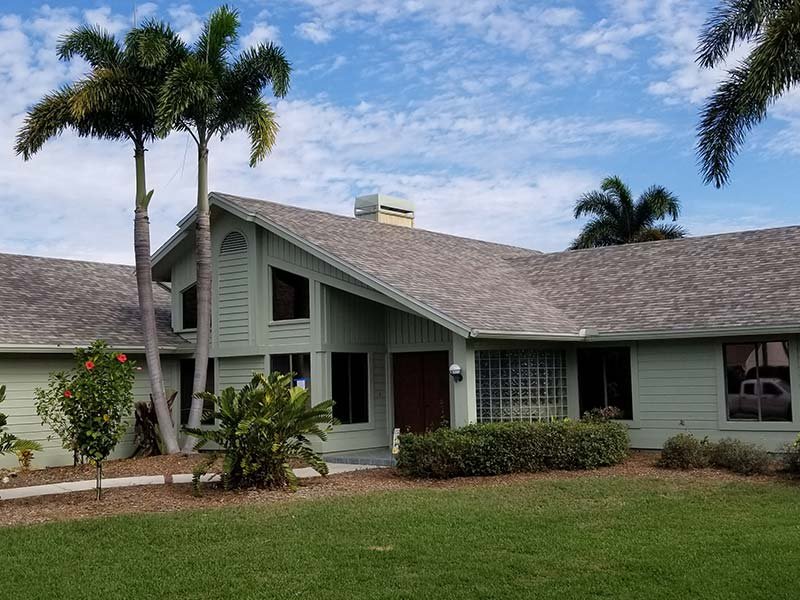 Slide of AKVM Roofing