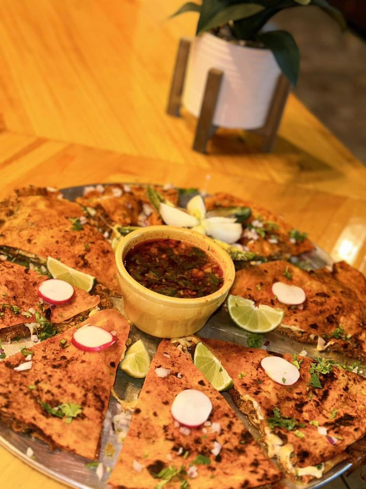 El Vaquero Mexican Grill Cantina Logo