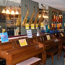 The Music Stand - Acoustic Pianos, Digital Pianos, Keyboards, Violins, Alto Saxophone, Tenor Saxophone, Flute, Clarinet, Trumpet.
