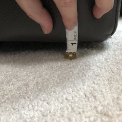 The Brick - Other side couch sits 1 inch off ground a full inch shorter than other side