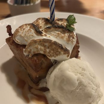 1010 Bridge Restaurant - Peach Bread pudding (with a candle for my birthday) - New American Near Me - Charleston, West Virginia 1010 Bridge Restaurant - Peach Bread pudding (with a candle for my birthday) - New American Near Me - Charleston, West Virginia