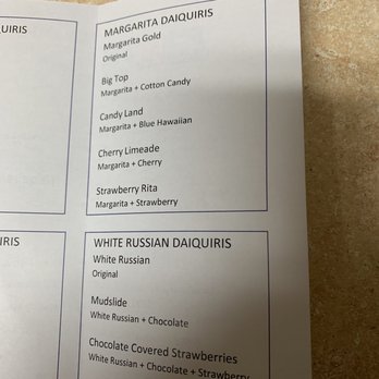 Happy Day Daiquiris - a menu for a white russian daiquiris - Dive Bars Near Me - Katy, Texas