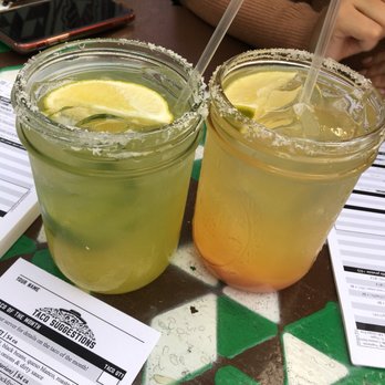 Condado Tacos - Jalapeño and peach margaritas for two happy customers - Tex-Mex Near Me - Columbus, Ohio Condado Tacos - Jalapeño and peach margaritas for two happy customers - Tex-Mex Near Me - Columbus, Ohio
