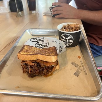 Smoke & Fire Social Eatery - Brisket Grilled Cheese. My partner always gets this. I'm not a fan of the cheese seared on the grill, but the sandwich is great. - Comfort Food Near Me - Paramount, California Smoke & Fire Social Eatery - Brisket Grilled Cheese. My partner always gets this. I'm not a fan of the cheese seared on the grill, but the sandwich is great. - Comfort Food Near Me - Paramount, California