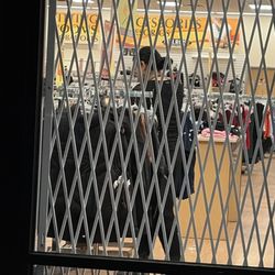 Melrose Family Fashions - Employee inside that says they close at 7:00pm !