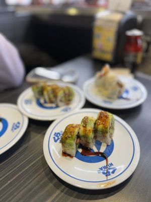 Kura Revolving Sushi Bar by null