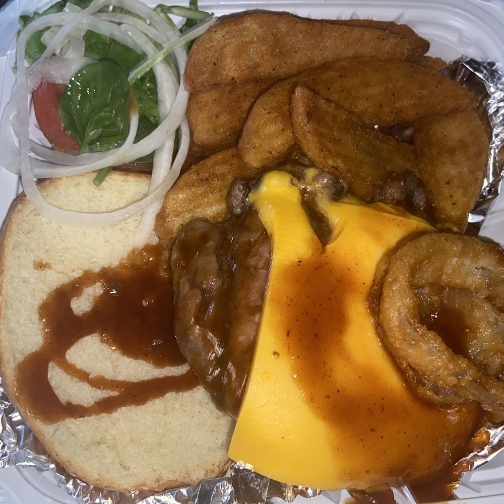 The Burger Place - a sandwich with onion rings, cheese, onion rings, and onion rings - Burgers Near Me - Atlanta, Georgia The Burger Place - a sandwich with onion rings, cheese, onion rings, and onion rings - Burgers Near Me - Atlanta, Georgia