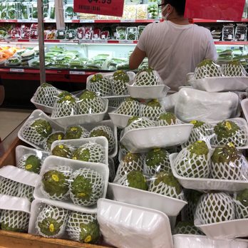 Jian Hing Supermarket - a man shopping in a grocery store - Grocery Near Me - North York, Ontario