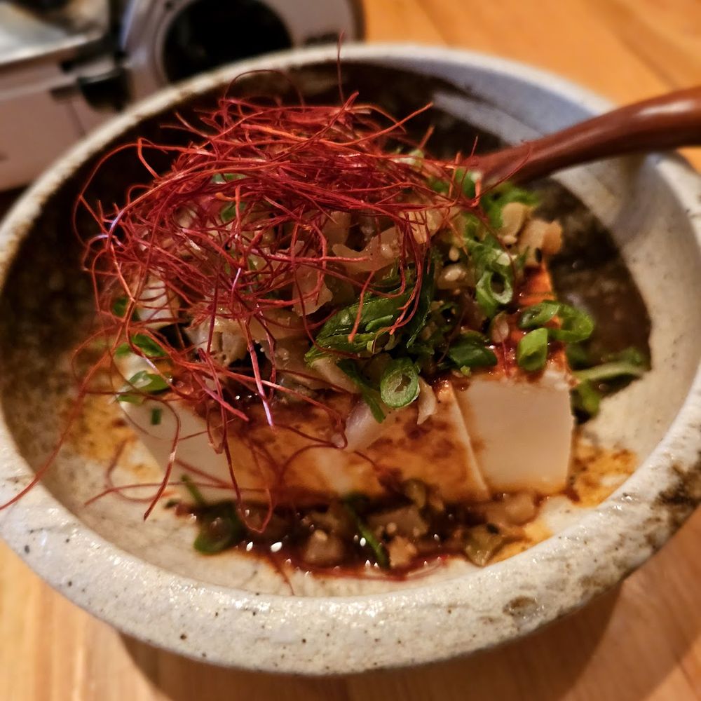 Kimura - Spicy Hiyayakko- Chilled tofu topped with housemade spicy miso sauce. $9. Very tasty - Japanese Near Me - New York, New York Kimura - Spicy Hiyayakko- Chilled tofu topped with housemade spicy miso sauce. $9. Very tasty - Japanese Near Me - New York, New York