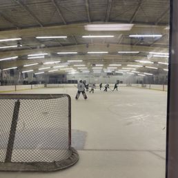 Kids hockey game in action. Kids hockey game in action.