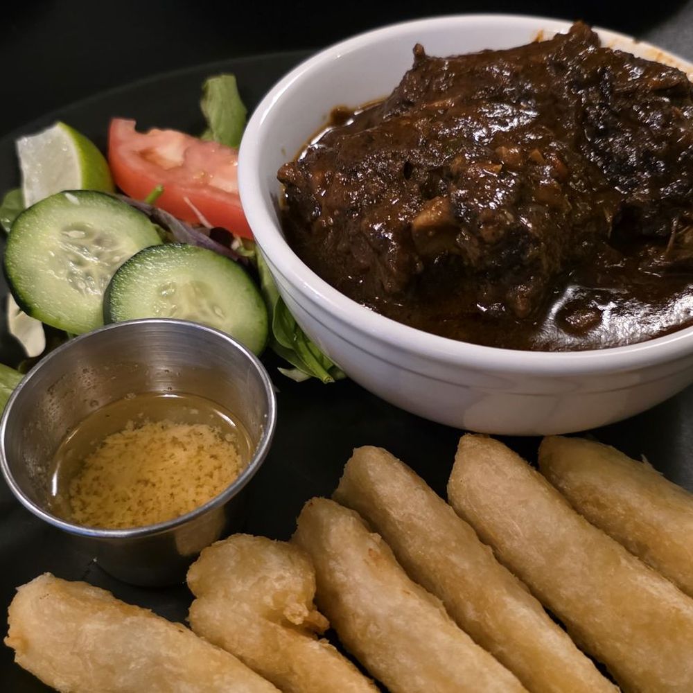 Punta Cana Caribbean Restaurant - Oxtails with yuca frita - Dominican Near Me - Houston, Texas Punta Cana Caribbean Restaurant - Oxtails with yuca frita - Dominican Near Me - Houston, Texas