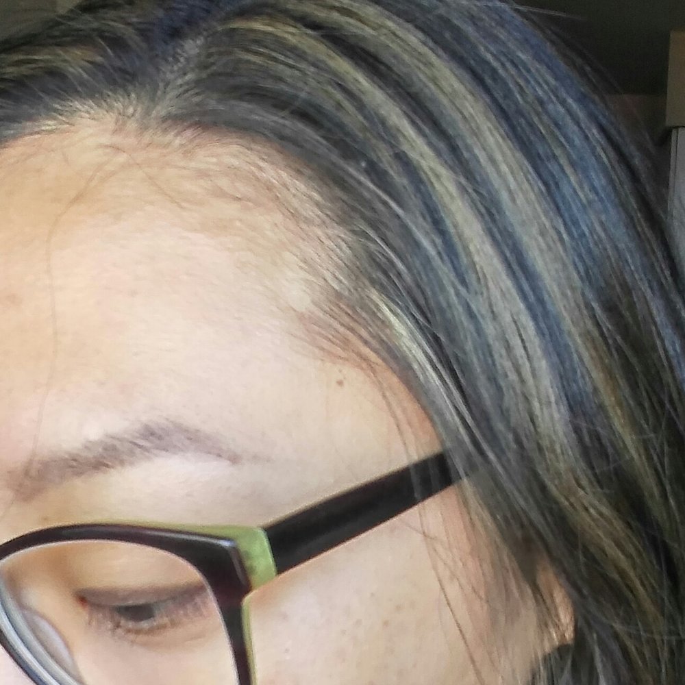 White dot of bleach on temple from previous terrible highlight work. GONE!
