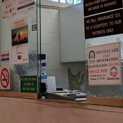 Wali Autar K, MD - A small glimpse of the reception area. I wish that unicorn on the wall could magically sanitize and paint this place.