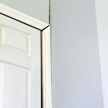 Moran Construction - the corner of a room with a door and a window - General Contractors Near Me - Marietta, Ohio