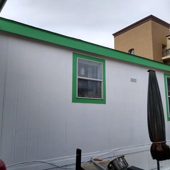Mickeys Painting - a white house with green trim - Painters Near Me Mickeys Painting - a white house with green trim - Painters Near Me