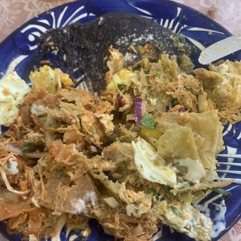 Buenos Días Cafe - Chicken egg chilaquiles with black beans. - Breakfast & Brunch Near Me - Gulf Breeze, Florida Buenos Días Cafe - Chicken egg chilaquiles with black beans. - Breakfast & Brunch Near Me - Gulf Breeze, Florida