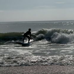 Wave Riding School - My son catching a wave!