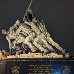 The Marines placing the flag at Marine memorial.