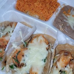 Shrimp tacos, were supposed to have everything on them.....missing lettuce and tomato.