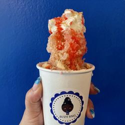 Santa's Cookie: regular or sugar-free cookie dough syrup topped with Xmas cookie crumble, whipped cream, and syrup