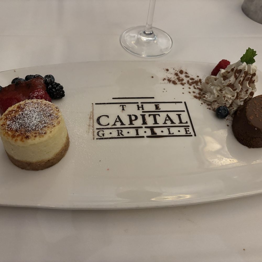 The Capital Grille - Desert Sampler with crème brûlée cheesecake and espresso cake - Steakhouses Near Me - Indianapolis, Indiana The Capital Grille - Desert Sampler with crème brûlée cheesecake and espresso cake - Steakhouses Near Me - Indianapolis, Indiana
