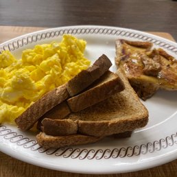 Three scrambled eggs grilled chicken and wheat toast Three scrambled eggs grilled chicken and wheat toast
