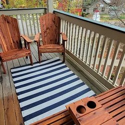 Grand Wood Suites - Breathe in the vibrant life of downtown Nashville from the tranquil comfort of your private balcony.