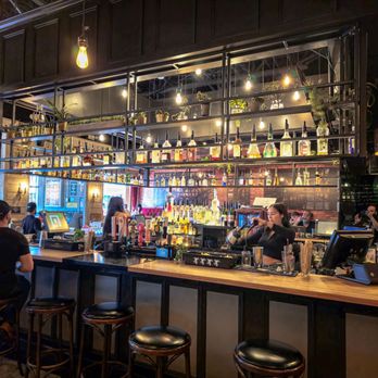 Jack Saloon - people sitting at the bar - Bars Near Me - Brossard, Quebec