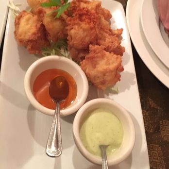 The Basil Restaurant - The calamari. They just melt in your mouth; so fresh and succulent. That white sauce is incredible too! Never had anything quite like it. - Thai Near Me - Carson City, Nevada