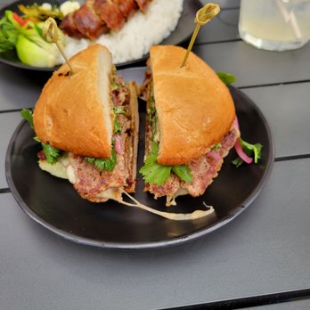 Taurus Ox - Lao Burger and Lao Pork Sausage Plate - Laotian Near Me - Seattle, Washington Taurus Ox - Lao Burger and Lao Pork Sausage Plate - Laotian Near Me - Seattle, Washington